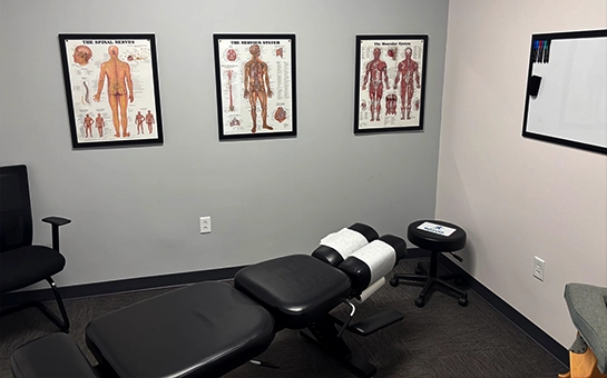 Chiropractic Adjustment Table In A Grey Room